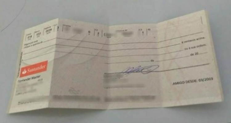 Rapaz acha cheque em branco e mobiliza internautas para achar dono
