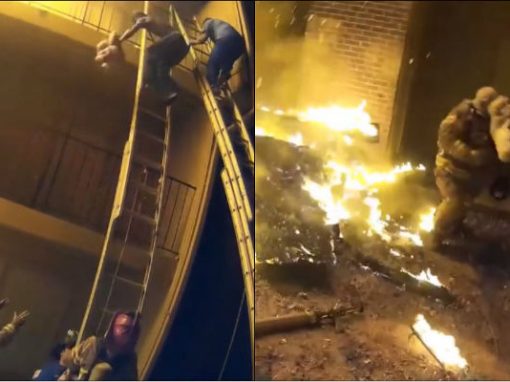 Criança é jogada de prédio em chamas e salva por bombeiros